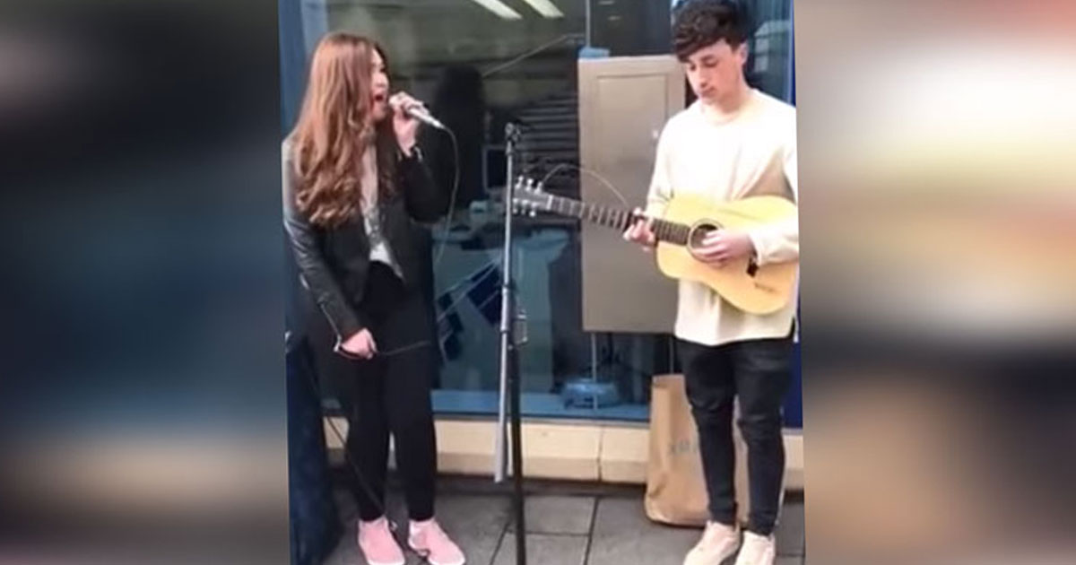 Teen Waiting For X Factor Audition Takes Busker’s Mic— Now Their Duet Is Going Viral